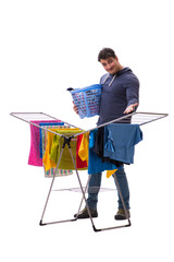 Wall Mural - Husband man doing laundry isolated on white