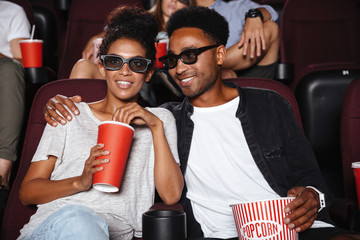 Poster - Happy afro american couple watching 3D movie