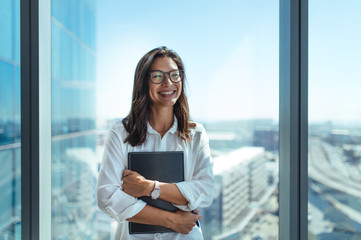 Wall Mural - Portrait of a smiling businesswoman.