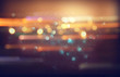 image of colorful blurred defocused bokeh Lights. motion and nightlife concept