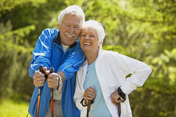 Senior couple doing Nordic walking