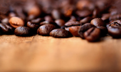 Wall Mural - Coffee Beans Caffeine Roasted Brown Espresso wallpaper with copy space  close up. Fried  Coffee Beans Texture macro