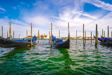 Wall Mural - Venice, Italy - July, 28, 2017: gondola on a Channel in Venice, Italy