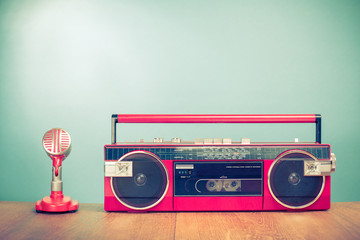 Wall Mural - retro radio cassette recorder from 80s and microphone front mint green background. vintage old insta