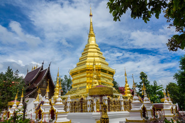 Thai Buddhist temple with blue sky in Thailand