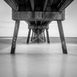 Black and white pier on the beach
