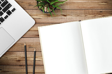 Top view of blank paper page on wood background office desk and different objects. Minimal flat lay style