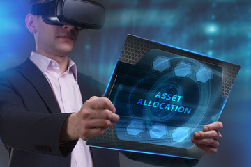 Business, Technology, Internet and network concept. Young businessman working on a virtual screen of the future and sees the inscription: Asset allocation