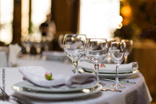 Beautiful Table Setting With Crockery And Flowers For A Party