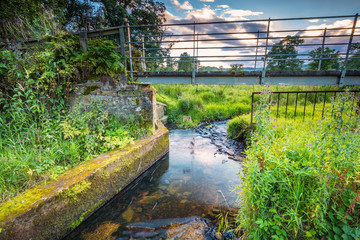 Poster - River Aln Footbridge / The River Aln runs through Northumberland from Alnham to Alnmouth. Seen here beginning to widen just after Alnham