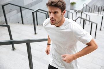 Sticker - Close up of a healthy male runner in sport clothes