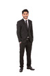 © asem arab - Full length shot of a happy handsome young businessman with hand in pocket smiling and looking to you, guy wearing black suit and black tie, isolated on white background