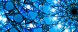 © sakkmesterke - Blue glowing stained glass 8k widescreen background