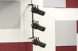 © HuzaimePhotography - industrial lights on the wall inside a building