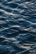 © Borislav Zhuykov/Stocksy - Dark blue ocean water