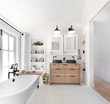 © Trinette Reed/Stocksy - Rustic modern farmhouse bathroom in small cottage