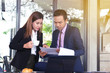 © Sky Stock - Business women and business men Work together in a coffee shop