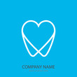 Logo tooth in the form of heart blue background