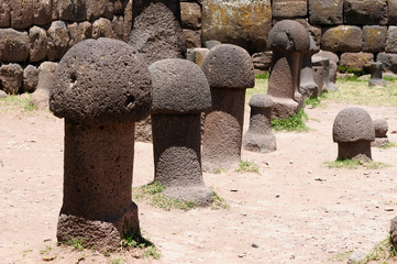 Peru Inca prehistoric ruins in Chucuito near Puno Titicaca lake area. This photo present stone phallus in temple de la Fertilidad