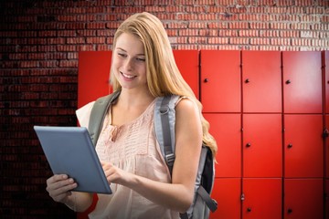 Canvas Print - Composite image of happy student using tablet