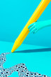 © Nicolle Clemetson - giant yellow crayon with googley eyes doodle, on blue background, conceptual