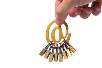 Wall Mural - Hand holding email sign with many padlocks / Email security and countermeasure concept