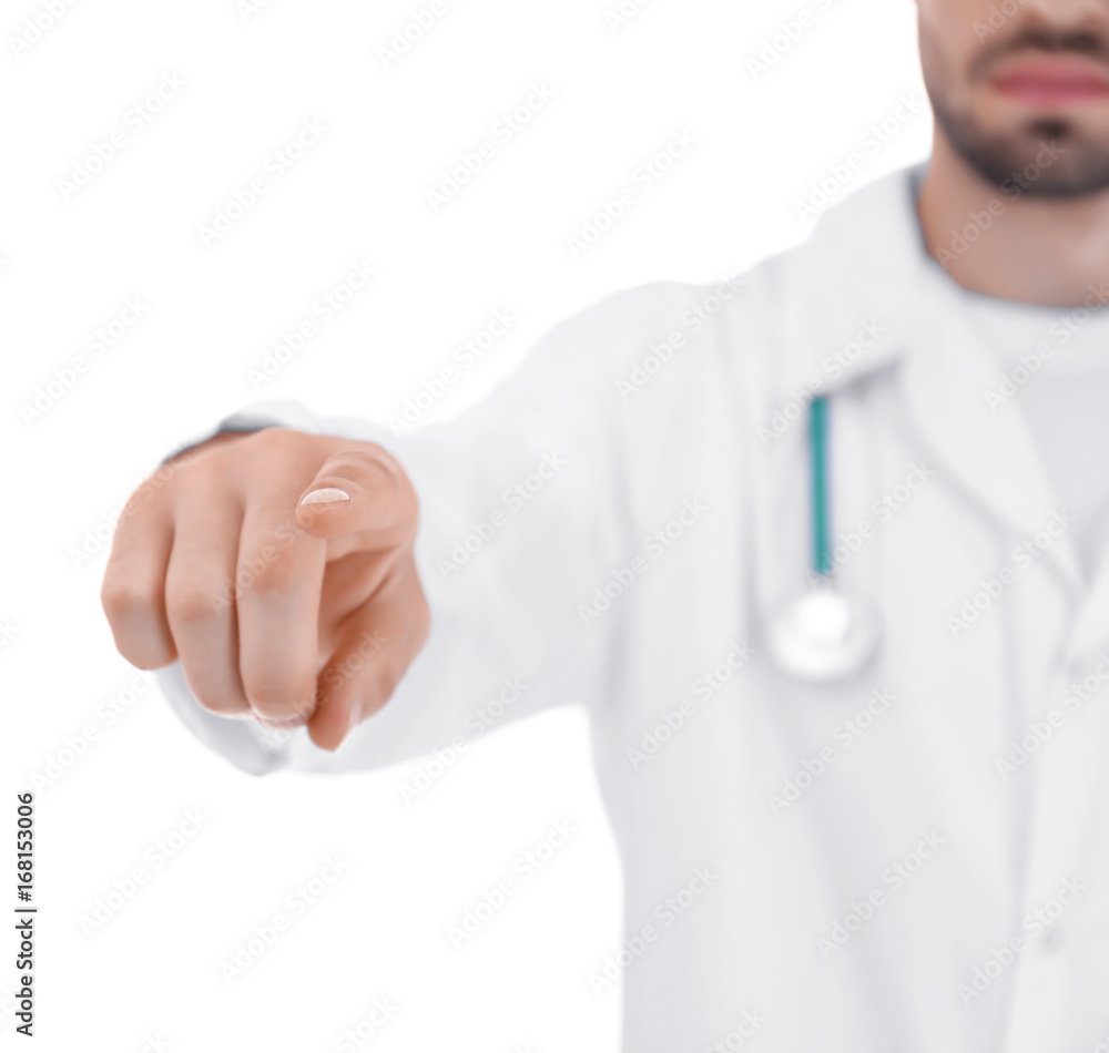 Young doctor using virtual screen, on white background