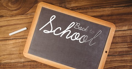 Poster - Back to school text on blackboard with chalk