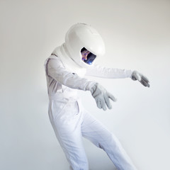 Wall Mural - Weightlessness. Fantastic space suit. Astronaut floating in the void