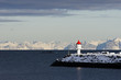 © Kolbjorn - Fyret i havnen på Dverberg, Andøy kommune, Vesterålen. Fotografert en februradag i sollys.