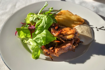 Roast pheasant on plate