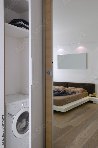 Interior Shots Of A Modern Bedroom With Wooden Floor In