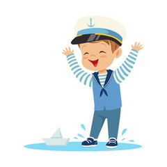 Canvas Print - Cute smiling little boy character wearing a sailors costume standing in a puddle playing with paper boat colorful vector Illustration