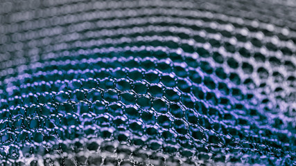 blue abstract texture from mesh. artistic detail of hexagonal grid in hd 16x9 ratio. concept for sci