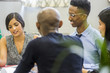 © Adam Hester/Blend Images - People talking in meeting