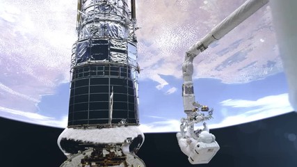 Wall Mural - NASA Astronauts are working on the space station in outer space against the Earth background.Elements of this image furnished by NASA.