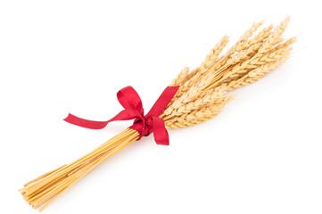 Wall Mural - Ears of wheat tied with red ribbon