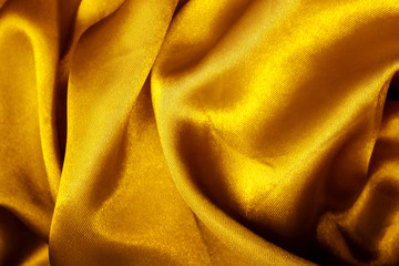 Gold fabric shiny abstract background for texture