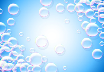 Canvas Print - Soap bubbles abstract blue background with rainbow colored airy foam