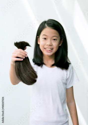 Teenage Girl Donating Her Healthy Hair To Cancer Patients