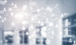 © adam121 - Concept of networking and connection against modern office blurr