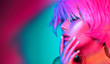 © Subbotina Anna - Fashion model woman in colorful bright lights, portrait of beautiful party girl with trendy makeup, manicure and haircut