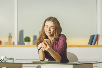 Wall Mural - Attractive lady using cellphone