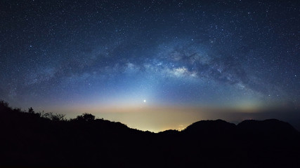 starry night sky with high moutain at doi luang chiang dao and milky way galaxy with stars and space