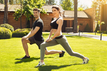 Wall Mural - Young couple exercise together outdoors healthy lifestyle