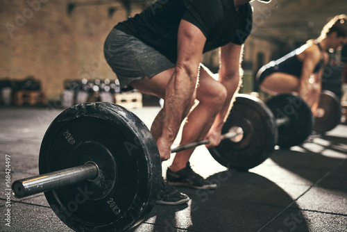 Fotomural Strong man doing deadlift training in gym
