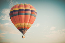 Vintage Hot Air Balloon Flying On Sky. Travel And Air Transportation Concept -vintage And Retro Filter Effect Style