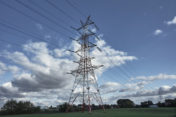 Power lines on a steel pole.