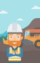 Wall Mural - A miner standing in front of a big mining equipment on the background of coal mine vector flat design illustration. Vertical layout.