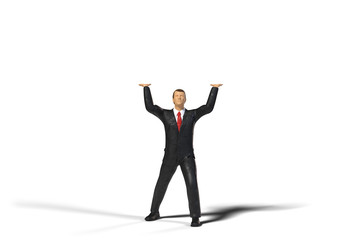 Canvas Print - toy miniature businessman figure lifting an empty space, concept isolated on white background